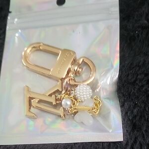 Gold and White Keychain Accessory